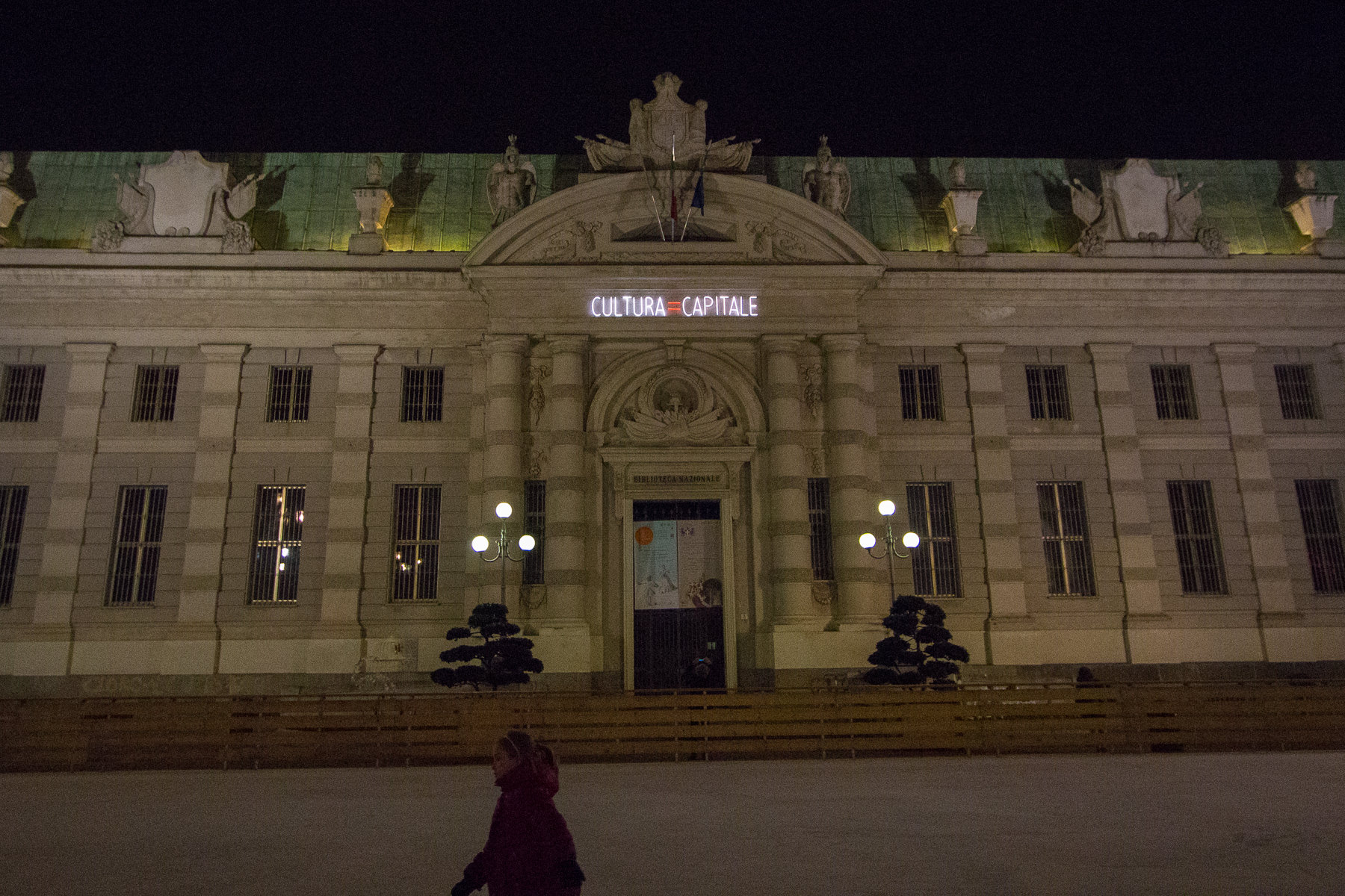 In Piazza Carlo Alberto, Alfredo Jaar's 'CULTURA = CAPITALE' is part of the Luci d'Artista since 2013. Jaar's work is a luminous equation inspired by the work of Joseph Beuys: 'Kunst = Kapital' (Art = Capital), which in turn interprets Karl Marx theory. - In piazza Carlo Alberto, dal 2013 far parte delle Luci d’Artista 'CULTURA = CAPITALE’ di Alfredo Jaar. Il lavoro di Jaar è un’equazione luminosa che trae ispirazione dall’opera di Joseph Beuys, ‘Kunst = Kapital’ (Arte = Capitale), che a sua volta rilegge la teoria di Karl Marx.