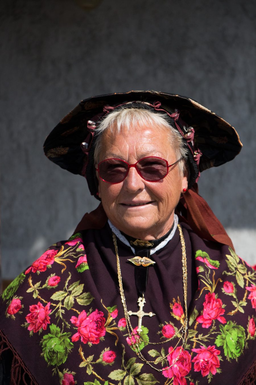Lady in traditional dress for the festivity of Allevè, 2018